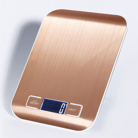 Stainless Steel Digital Kitchen Scale in gold with a digital display and buttons for unit conversion.