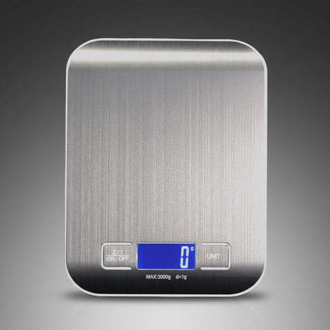 Stainless Steel Digital Kitchen Scale with LCD display for precise weighing up to 5kg, sleek design and compact size.