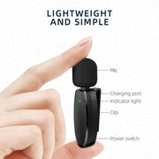 Wireless Lavalier Microphone shown being held, showcasing its lightweight design and simple functionality.