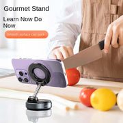 Magnetic Car Phone Holder mounted on a kitchen counter with vegetables, showcasing strong grip and usability.