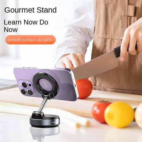 Magnetic Car Phone Holder mounted on a kitchen counter with vegetables, showcasing strong grip and usability.