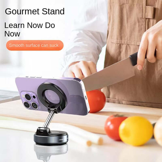 Magnetic Car Phone Holder mounted on a kitchen counter with vegetables, showcasing strong grip and usability.