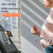 Magnetic Car Phone Holder in use, securely mounted while watching a movie on a treadmill.