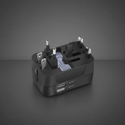 Multifunction charger for travel with dual USB ports and multiple international plugs.