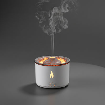 Essential oil humidifier diffuser with jellyfish flame simulation on a wooden table.