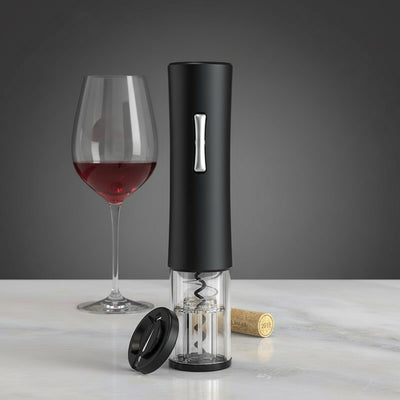 Electric wine bottle opener USB next to a glass of red wine, perfect for effortless wine enjoyment.